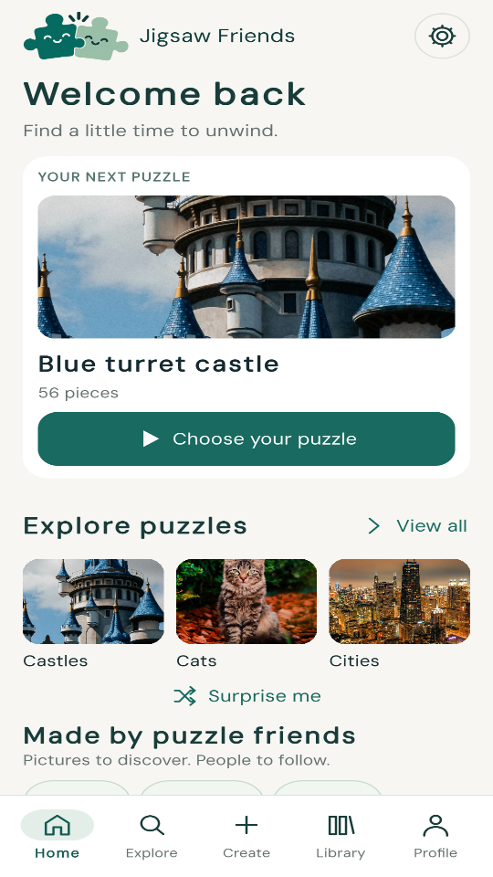 Jigsaw Friends game preview showing a castle puzzle, picture categories, and the cream-and-teal interface